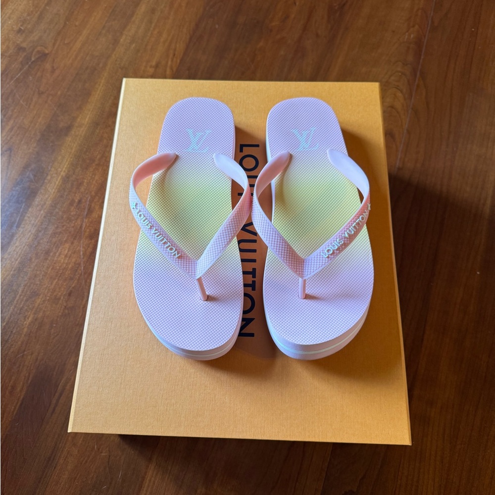 Louis Vuitton pink and yellow pool flip flops. Size 38.